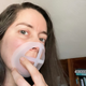 I'm holding a mask bracket against my face (no mask) to show where it fits